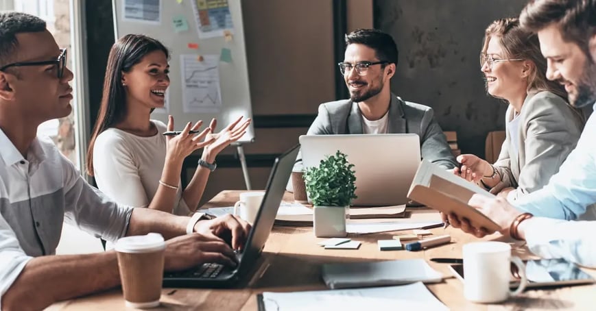 Corporate travel planners in a meeting