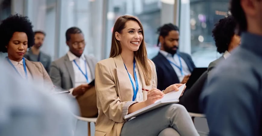 Group of Executive Assistants sitting at a business conference