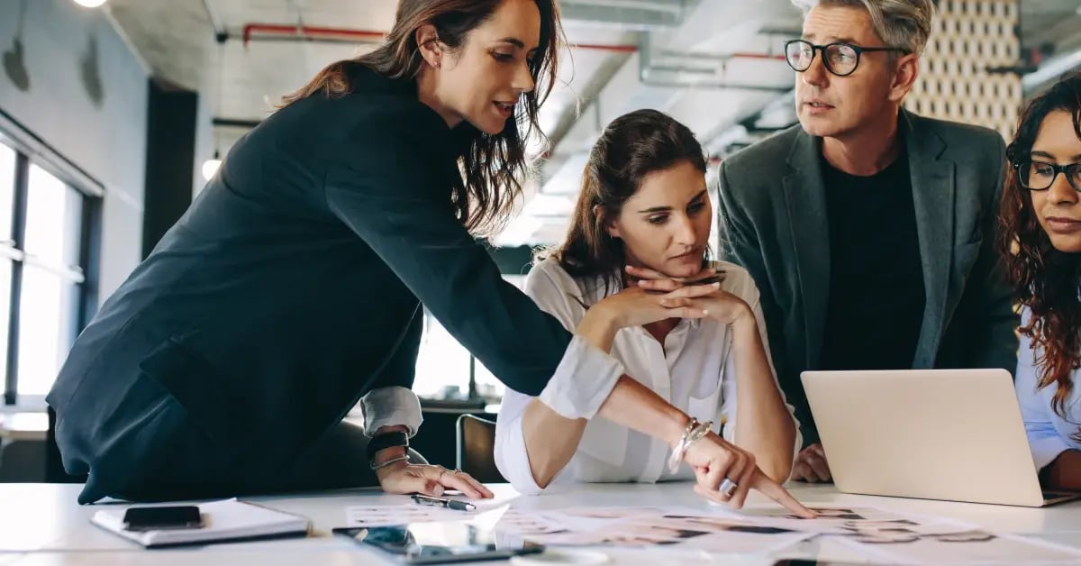 Team training in the office on using AI in the workplace