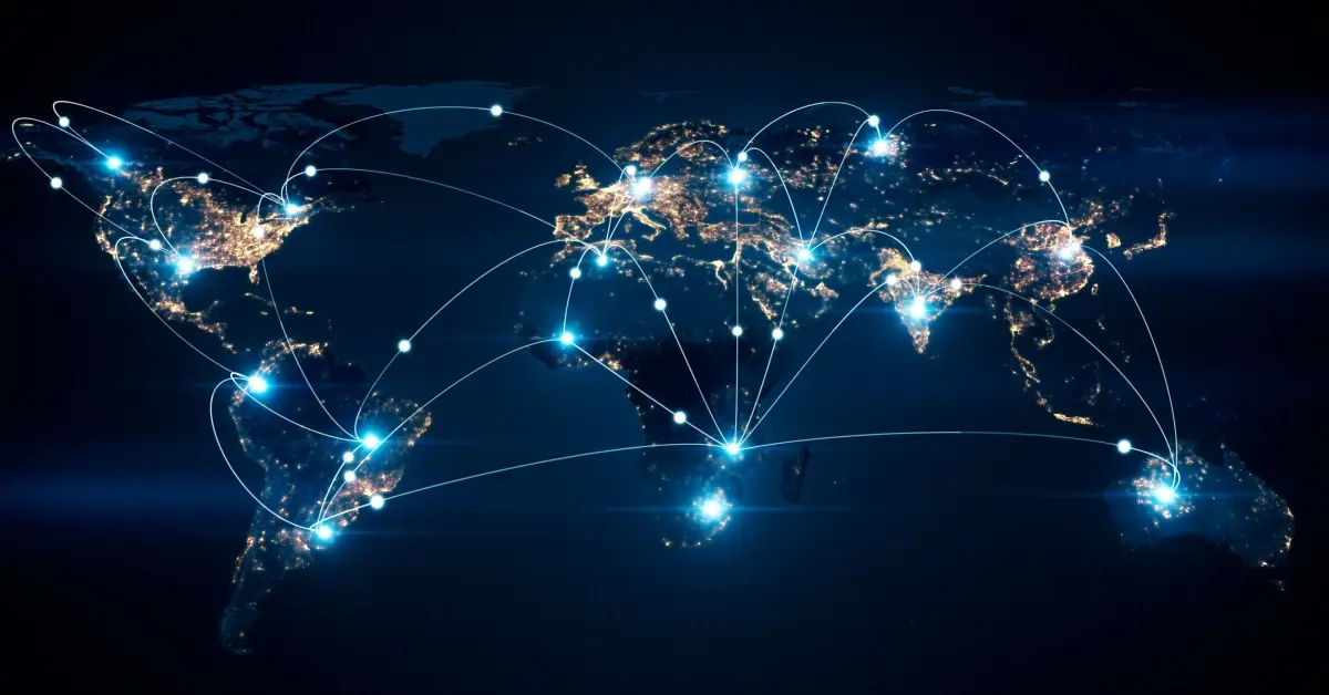 A night view of the world map with some country destinations marked in a white dot