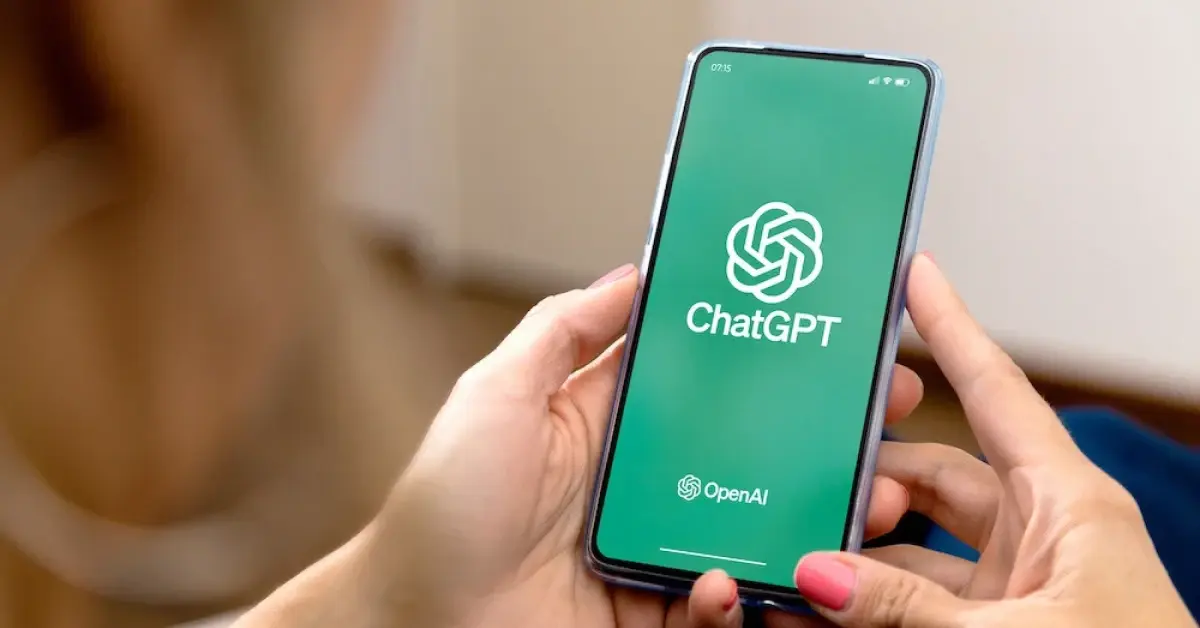 Executive Assistant Using ChatGPT AI on her cell phone